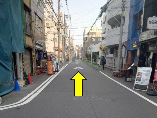 Straight road, arrow pointing ahead